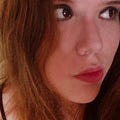 Go to the profile of Rhea