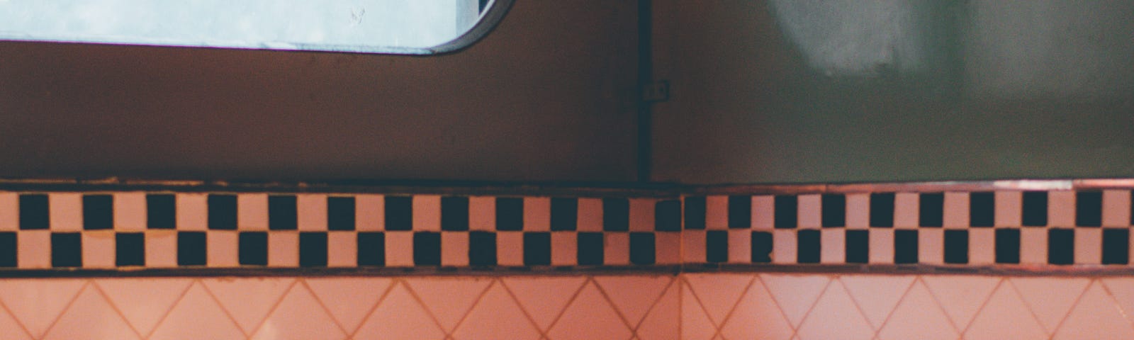 a photo of a booth and table inside a retro diner