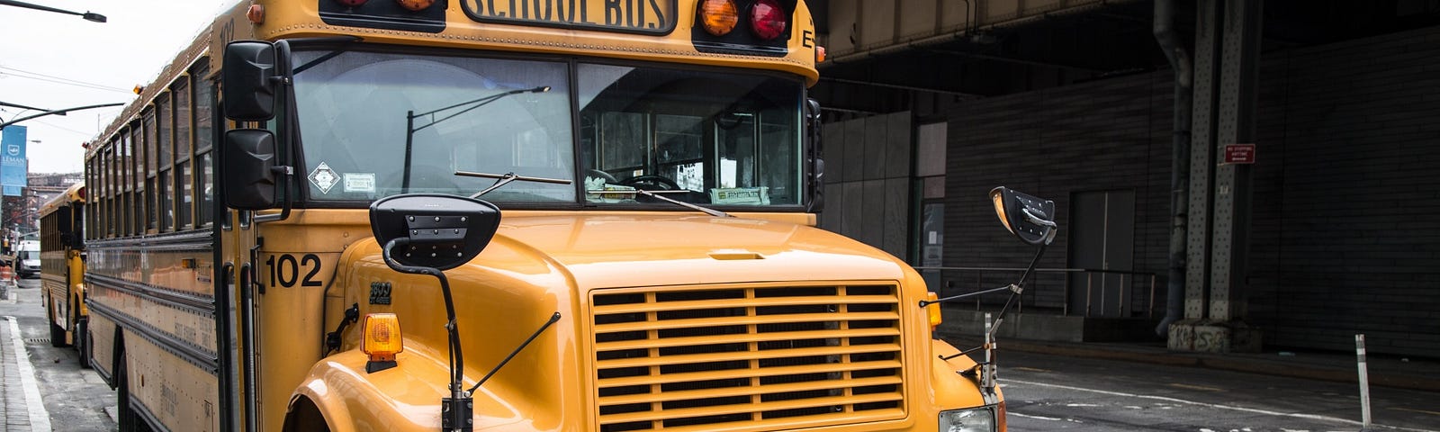 Image of a school bus to accompany reference to the children’s song, “Wheels on the Bus.”