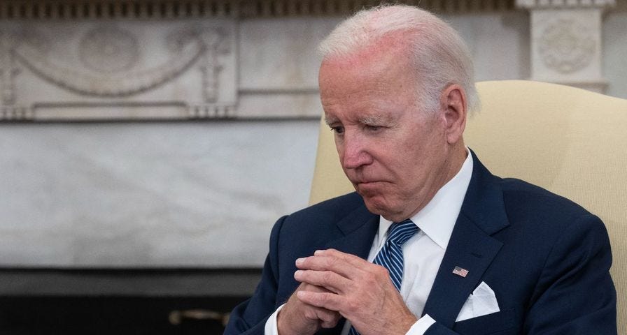 President Joe Biden sitting in the Oval Office at the White House.