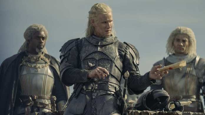 Daemon Targaeryan (platinum blonde man in armor) scoffs contemptuously as he passes a note back to the messenger (off screen).