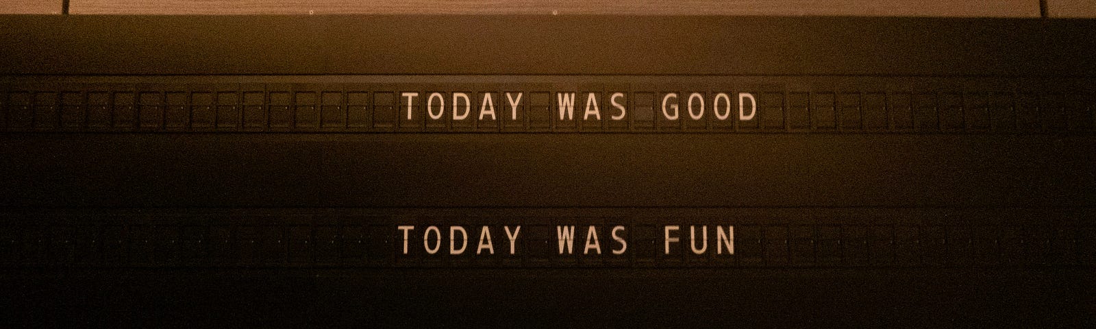 A signboard with 3 lines of text: “TODAY WAS GOOD, TODAY WAS FUN, TOMORROW IS ANOTHER ONE