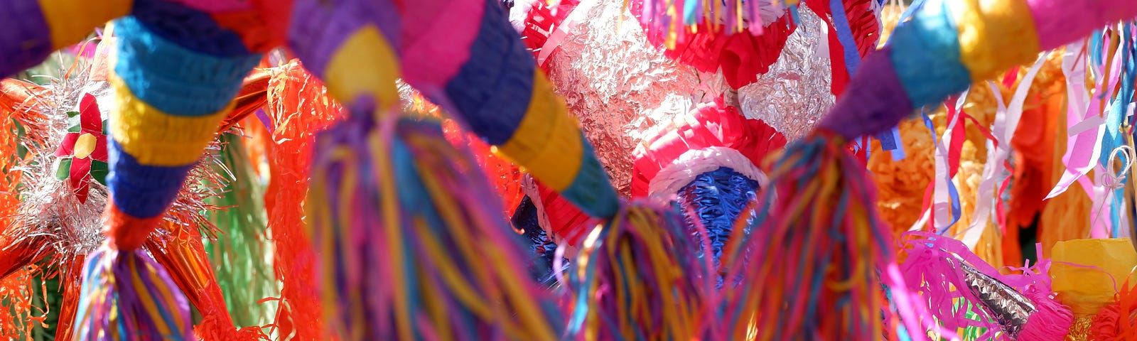Colorful scene filled with piñatas