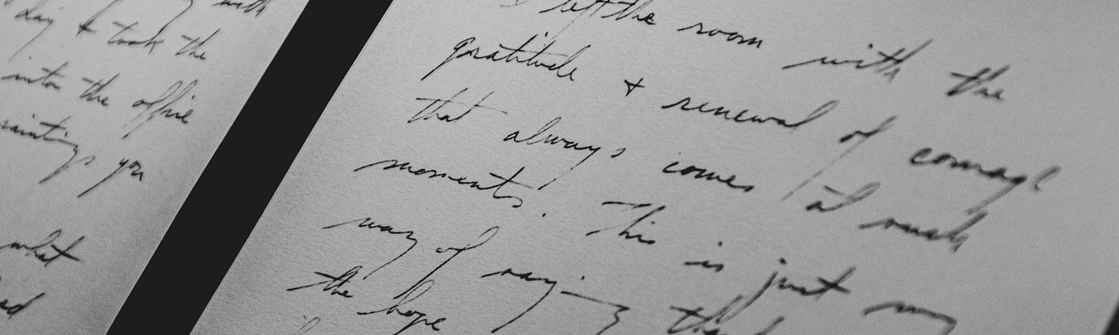 A handwritten letter in black and white, landscape.