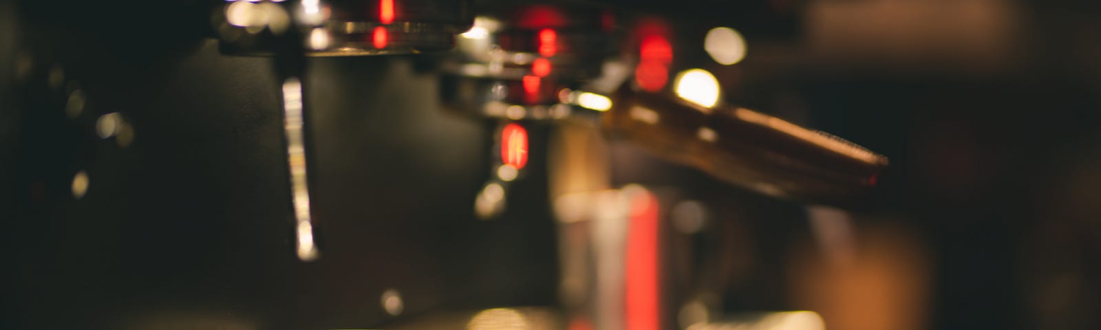 Coffee machine in a bar with a cup of coffee