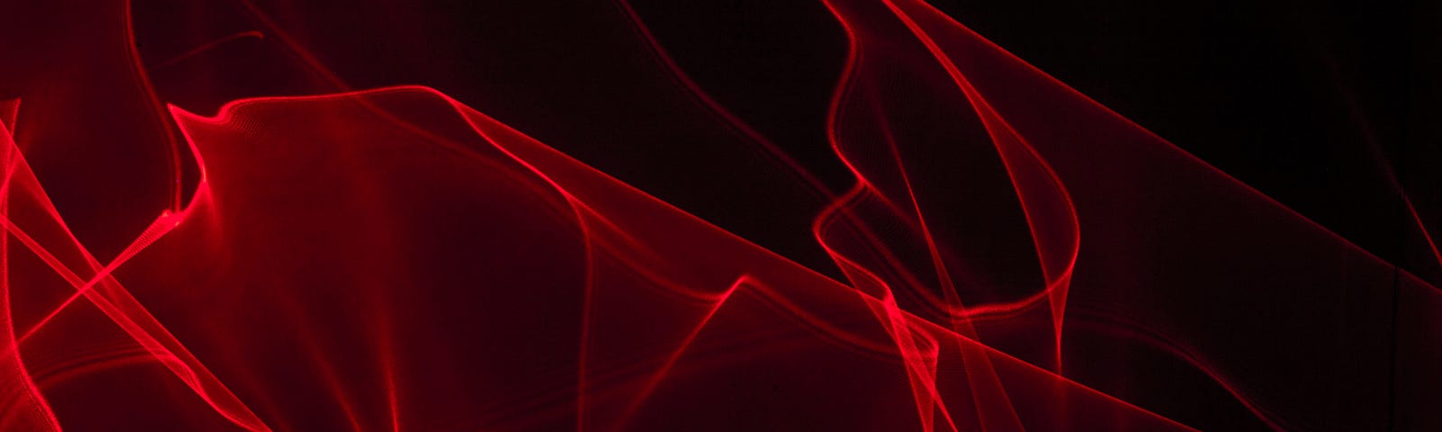 red virbrational waves against a black background