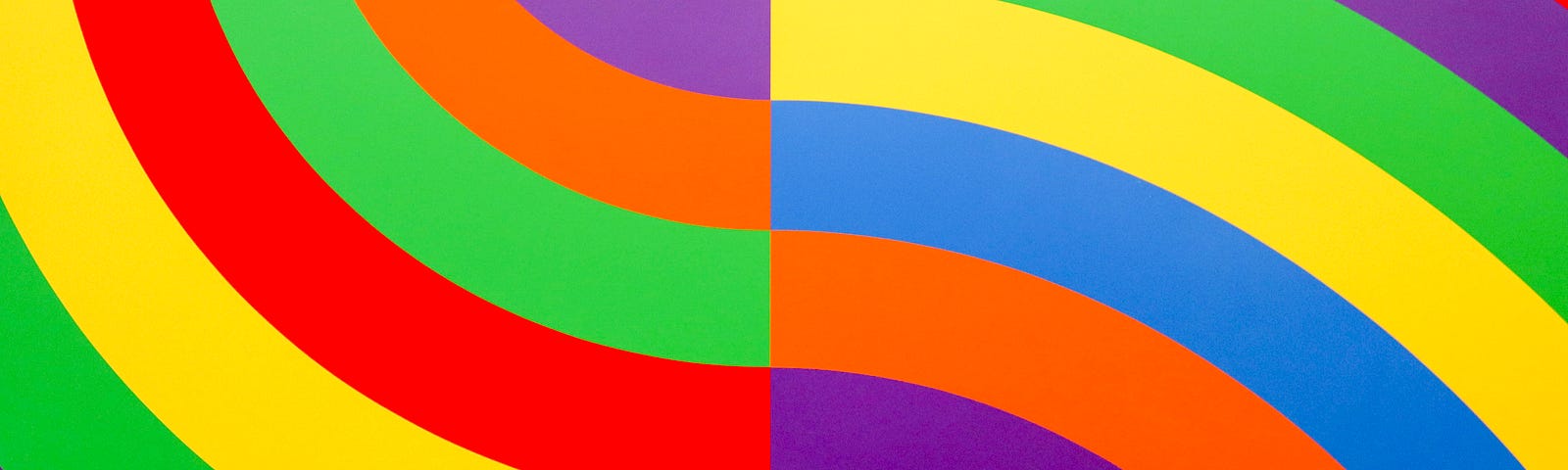 (ID: Two contrasting wave patterns, in rainbow colours of purple, green, yellow, red, blue, and orange.)