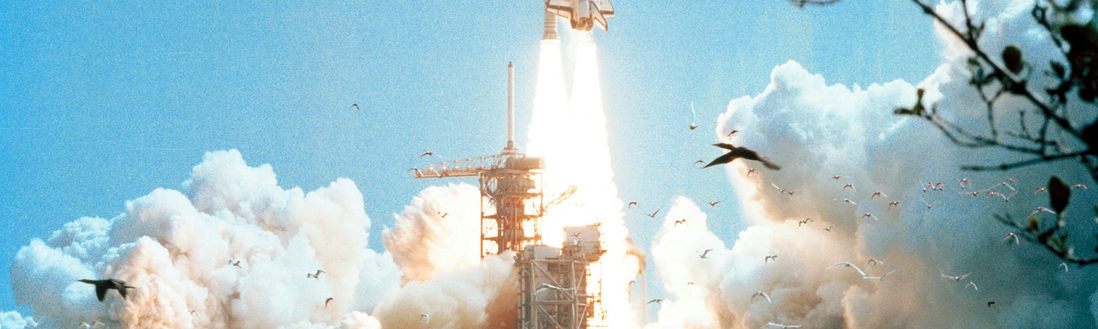 Space shuttle launching from Cape Canaveral.