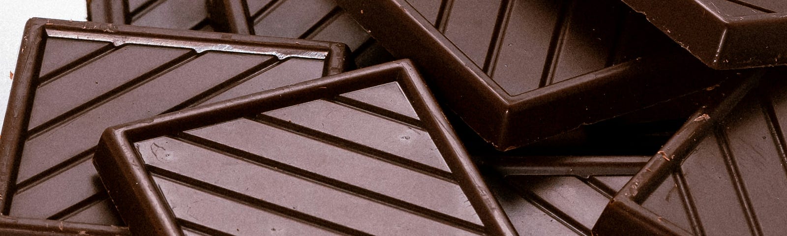 squares of chocolate on a metal plate