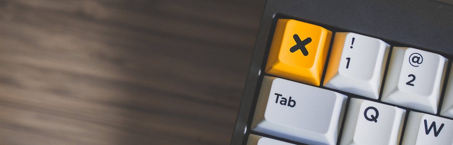 Keyboard with yellow X key