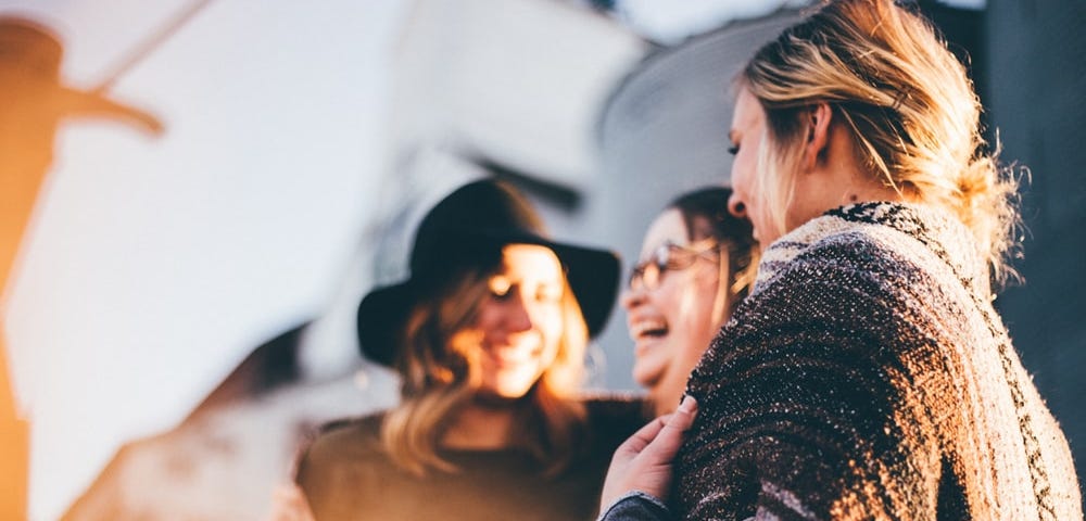 Young women laughing. https://unsplash.com/photos/nF8xhLMmg0c