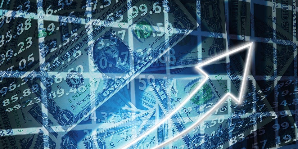 A white arrow pointing upwards indicates a booming economy. Background in dark colors with various numbers and dollar bills.