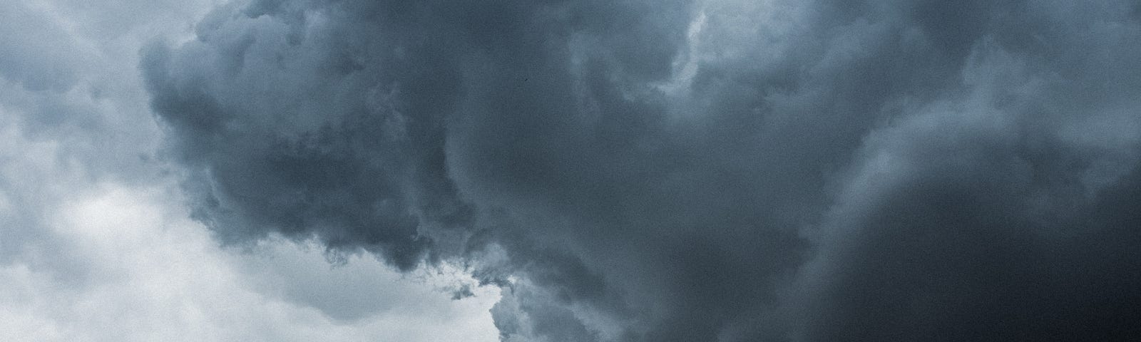 A large formation of shadowy clouds.