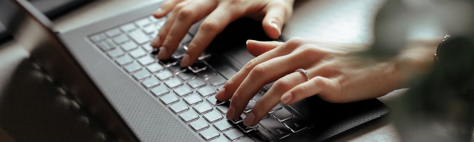 Beautiful young woman in the home office. Working from home. Teleworking concept