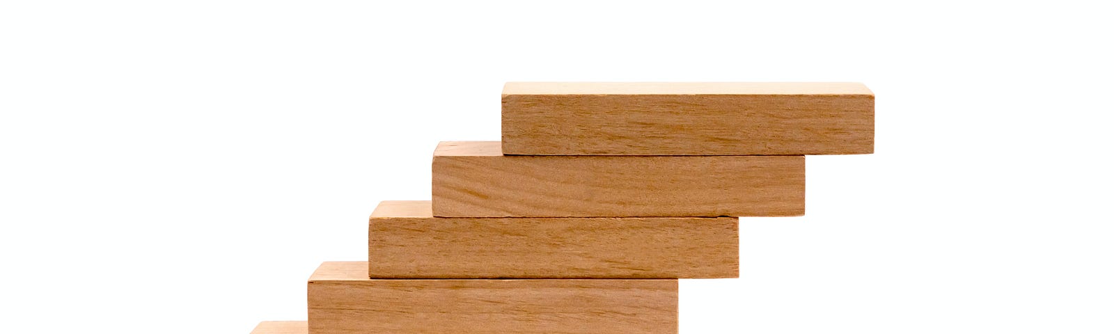 wooden blocks one on top of the others, forming a ladder