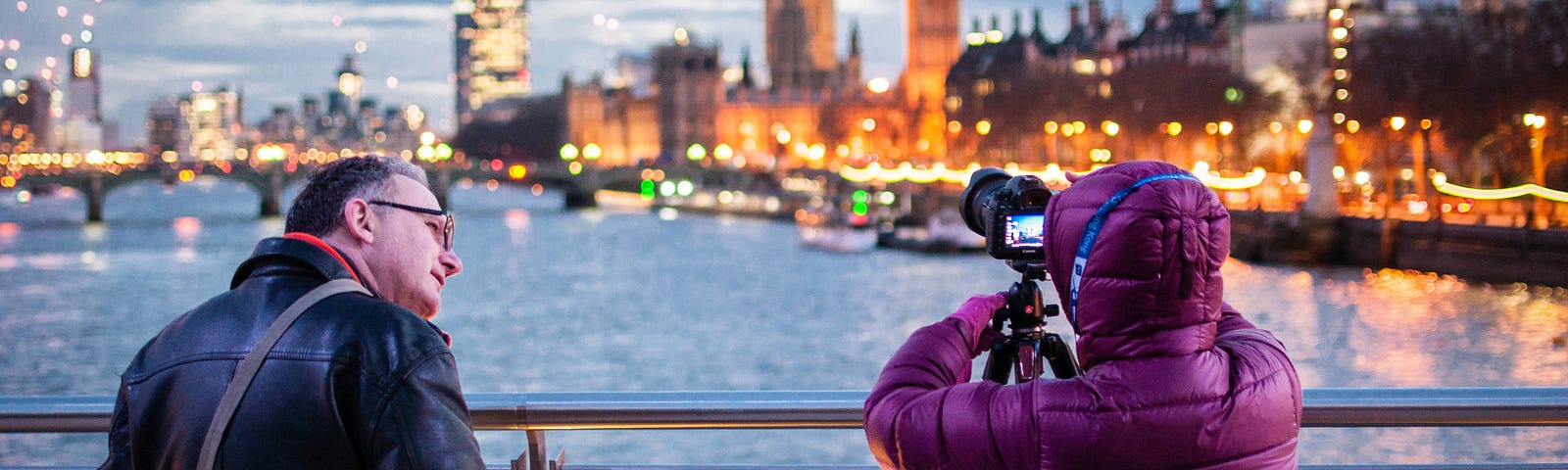 Woman using auto iso to capture skyline at dusk