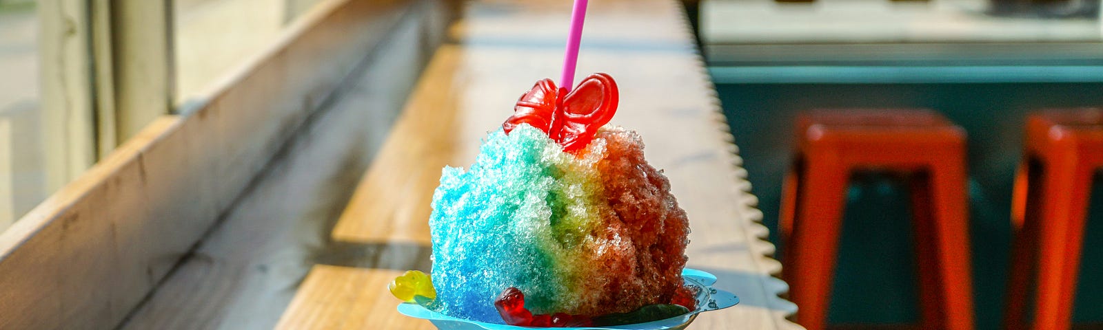 A beautiful and delicious rainbow-colored snow cone