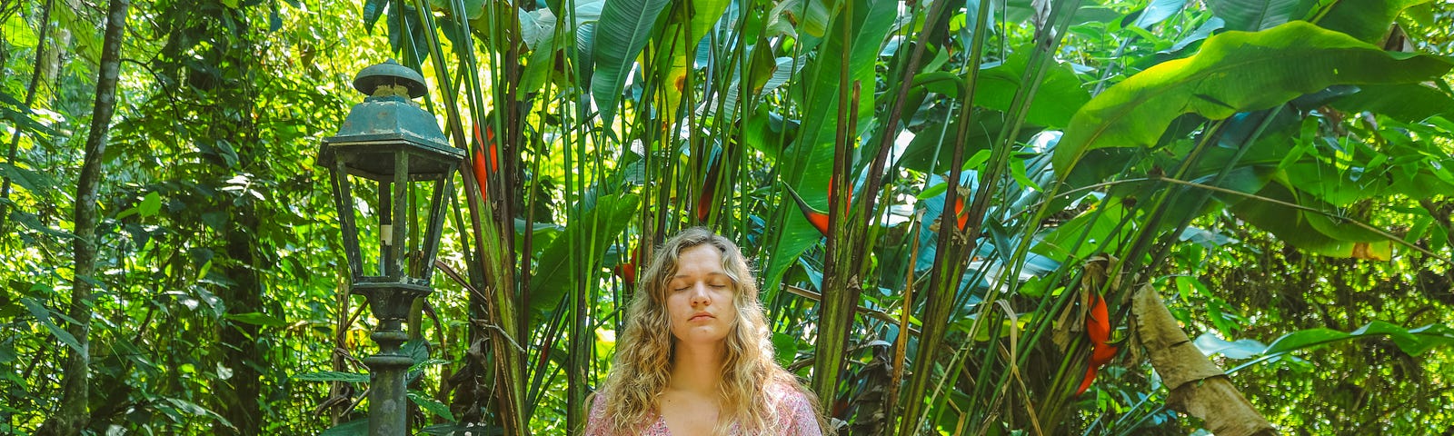 girl doing meditation in a garden