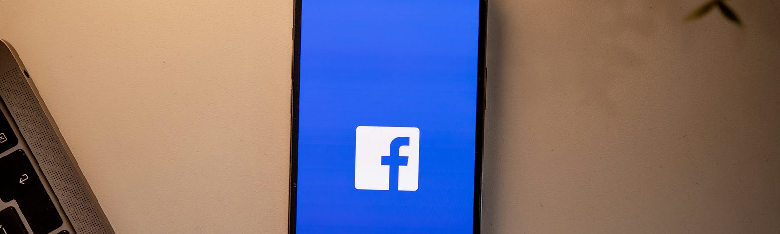 A Smart Phone Showing the Facebook Logo