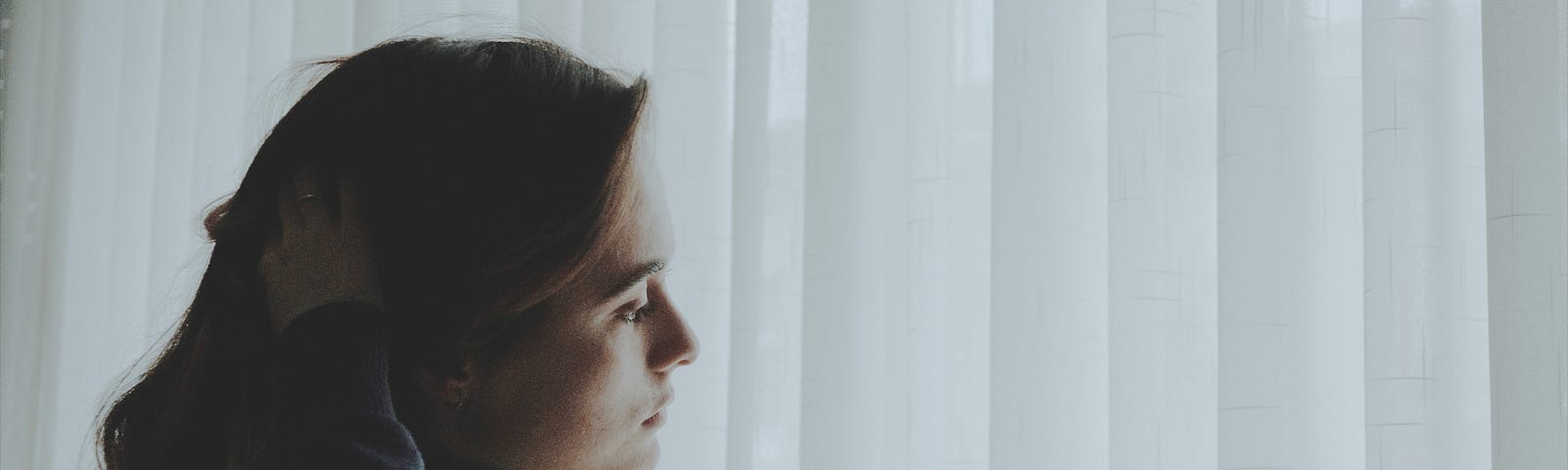 A woman looking out the window