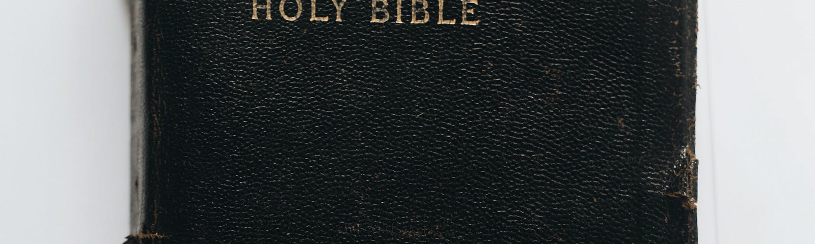 A worn and well-read copy of the Christian Bible.