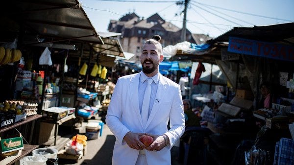 Presidential candidate Luka Maksimovic, known as Beli, a 25-year-old satirist, campaigns in the Serbian town of Mladenovac on March 21.