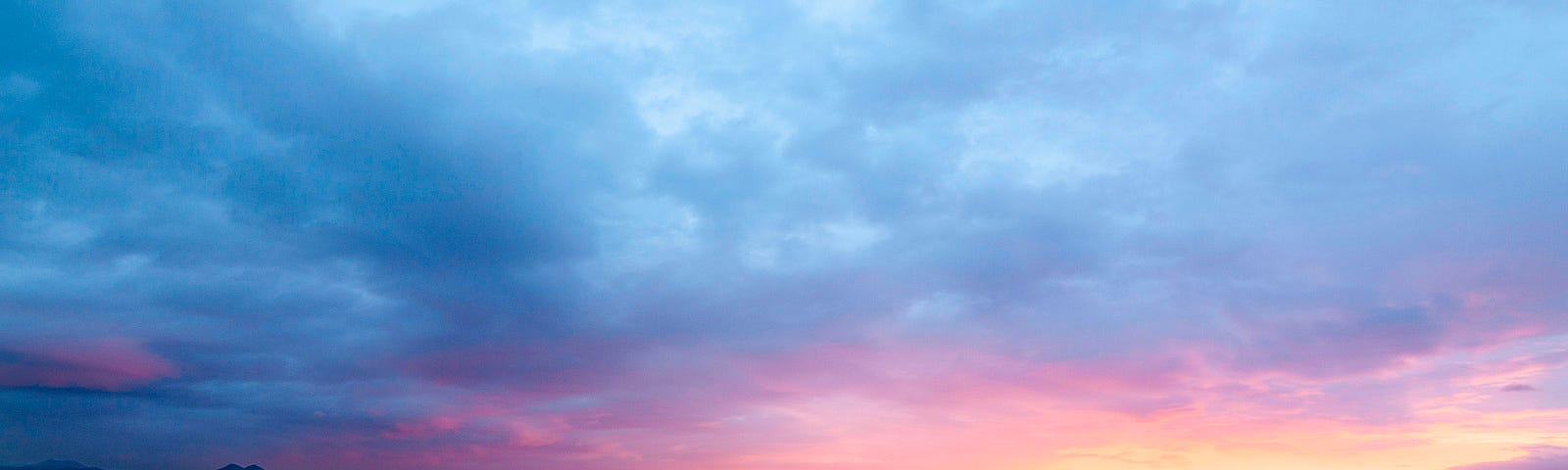 breathtakingly colorful sunrise with hues of blue, pink and purple