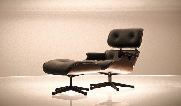 Copy of Charles and Ray Eames Lounge Chair & Ottoman. (Image source: Wikimedia Commons). (Changes made — muted filter/grain and vignette). Creative Commons license: CC BY 2.0.