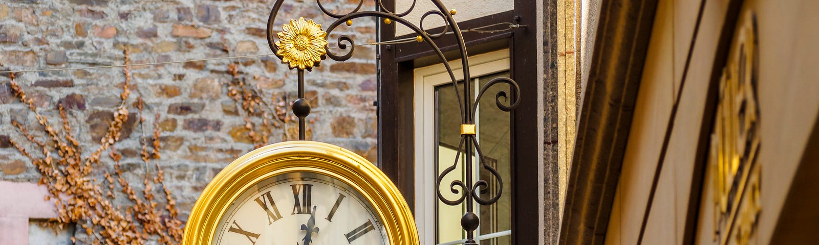 Golden clock in a street