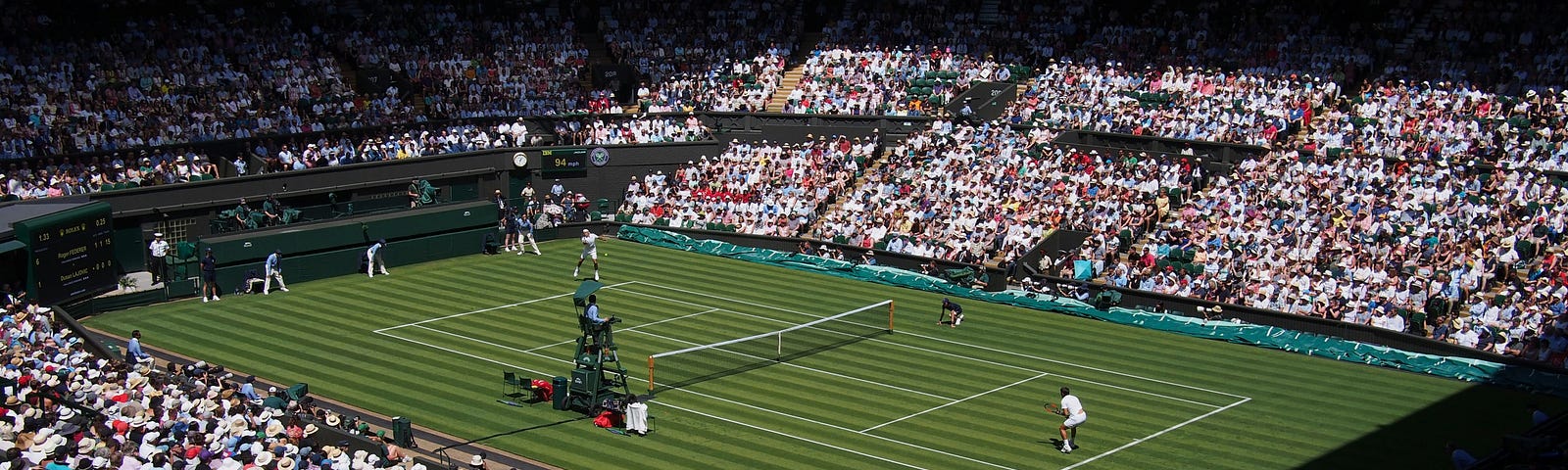 tennis court with tennis players and tennis watchers