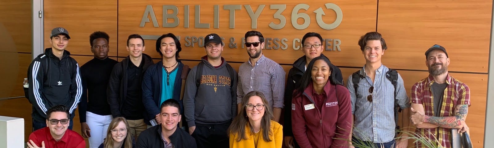 Participants of the tour stand outside of the Ability360 Sports & Fitness Center