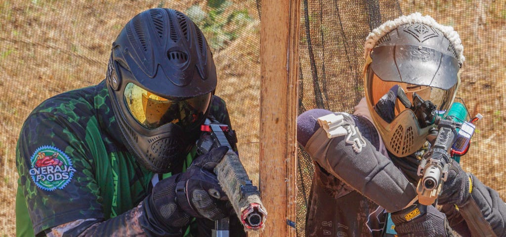 two airsoft competitors facing off