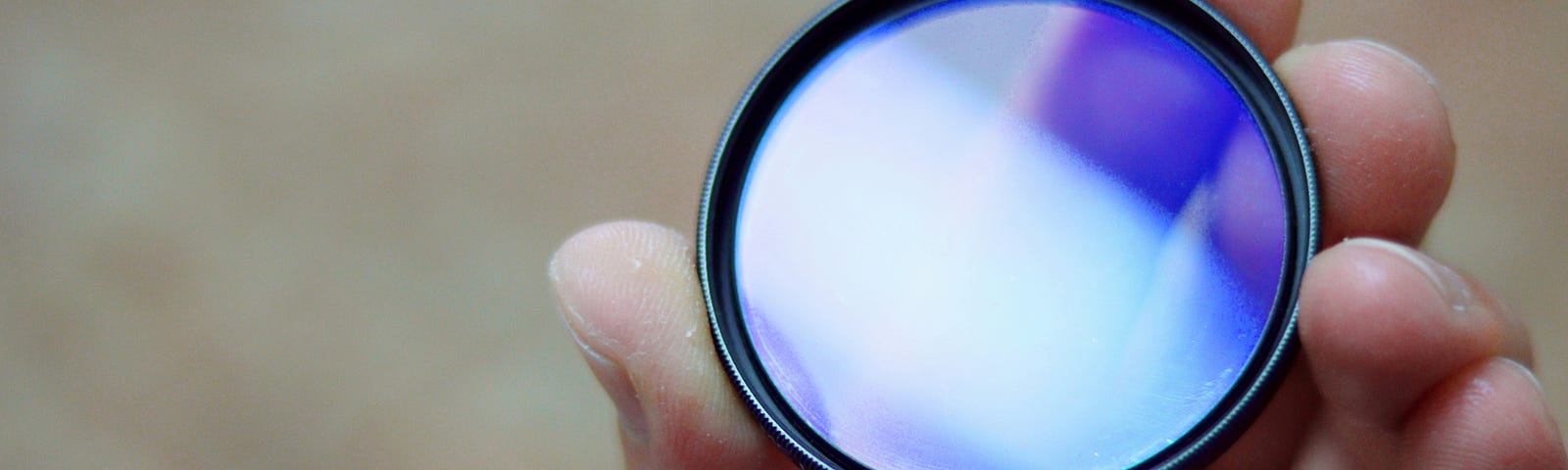 Holding a lens