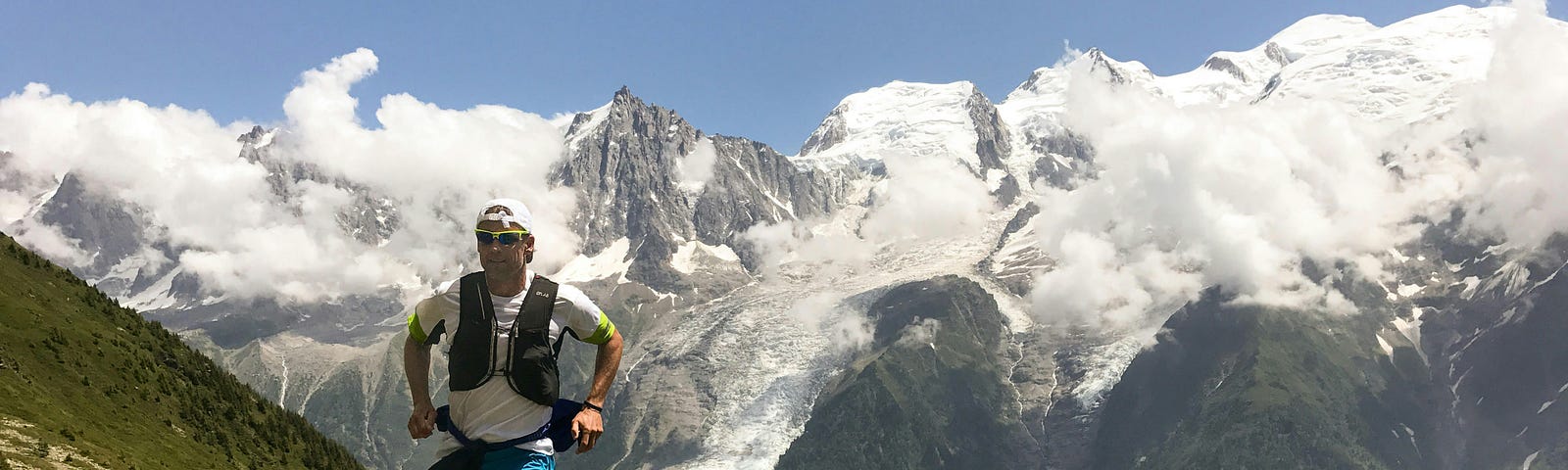 Runner on an Apline trail.