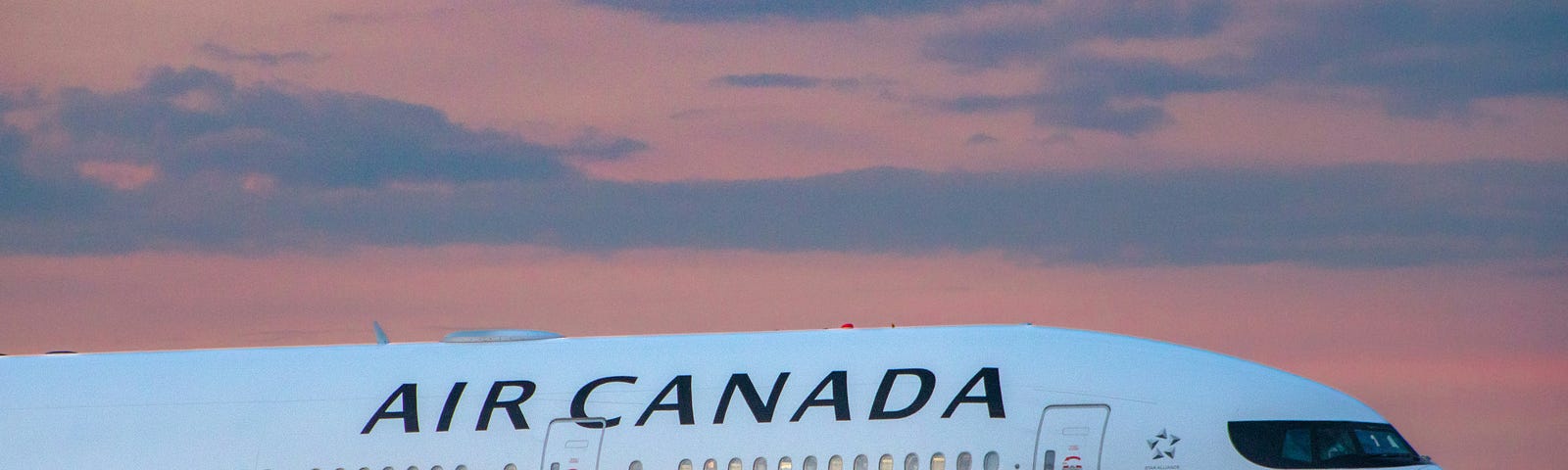 It’s not goodbye but see you later. Image of Air Canada plane.