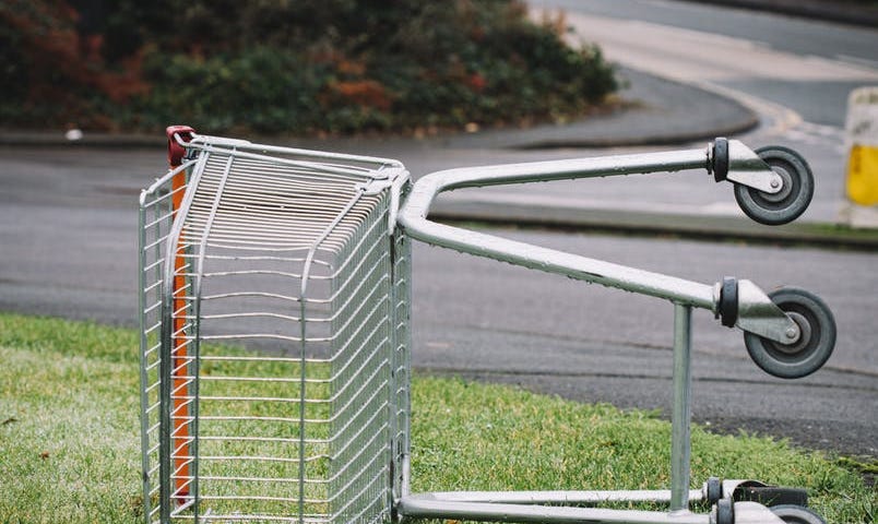 A picture of a metal cart turned on its side.