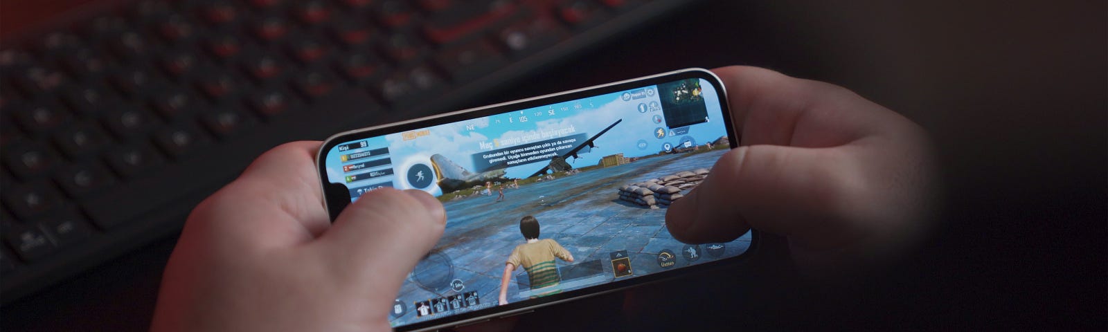 Someone playing a mobile game