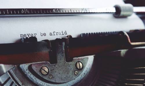 Typewriter: Never Be Afraid; What Scares You? 101 Quotes to Overcome It