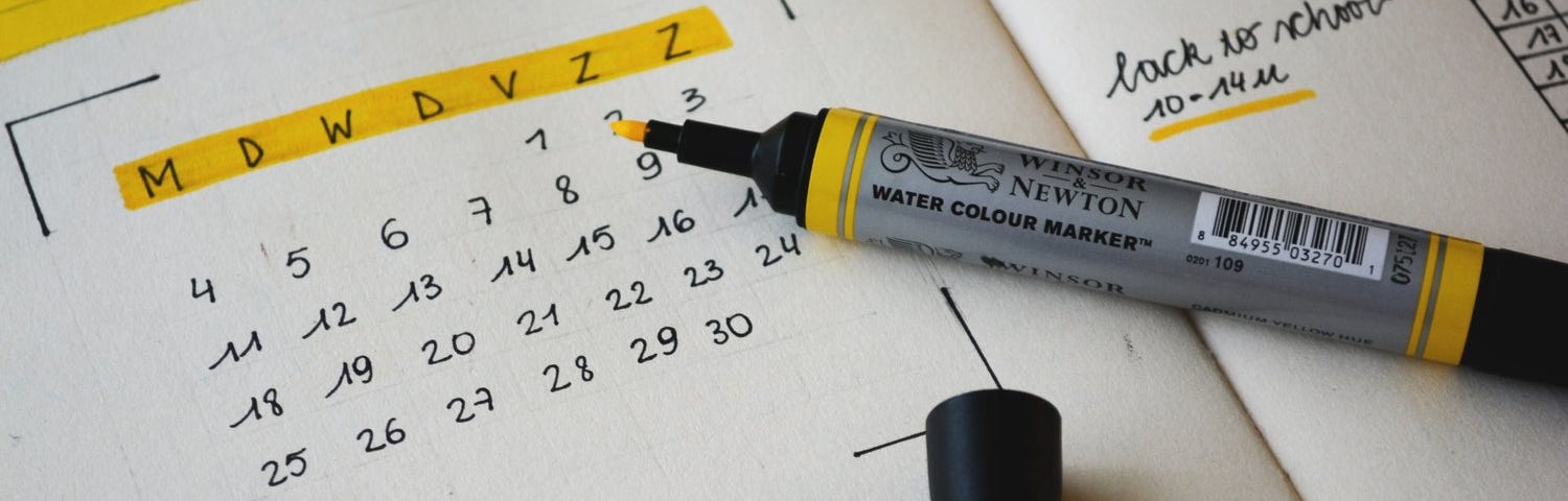 Handwritten calendar with the days of the week highlighted in yellow