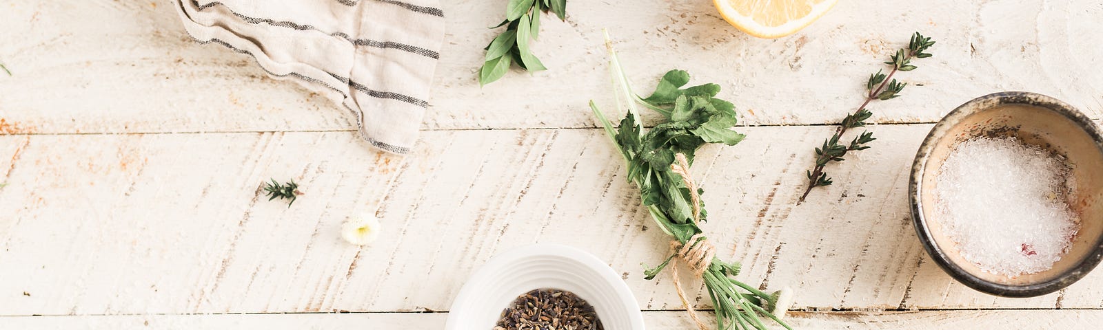 herbs, spices and lemon on a table