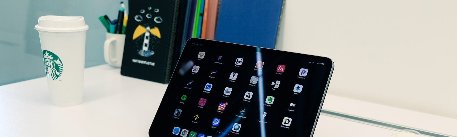 iPhone and iPad on a white table