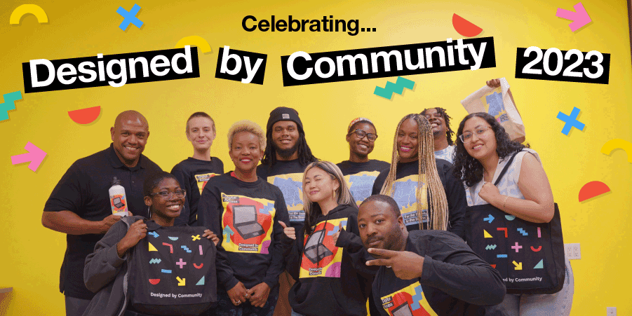 A photo of the eleven designed by community team members smiling with a yellow background.