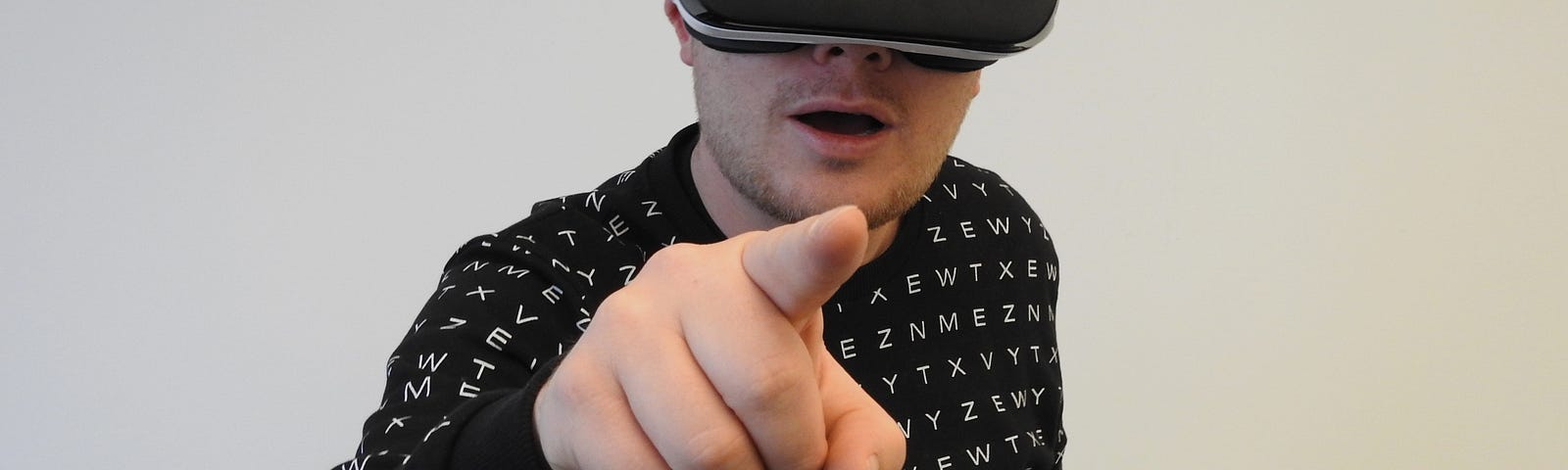 Person With VR Headset Pointing