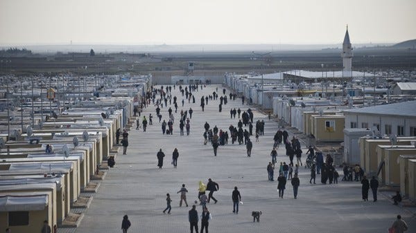 Syrian refugees are seen at Elbeyli accommodation facility in Kilis, Turkey.