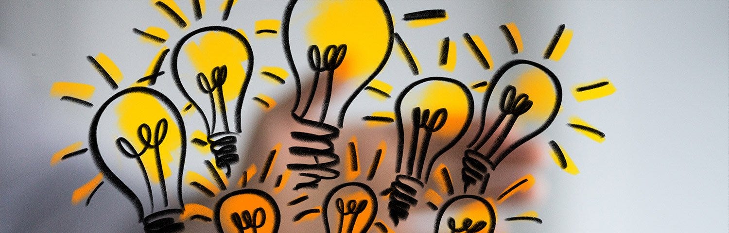 A bunch of hand-drawn light bulbs