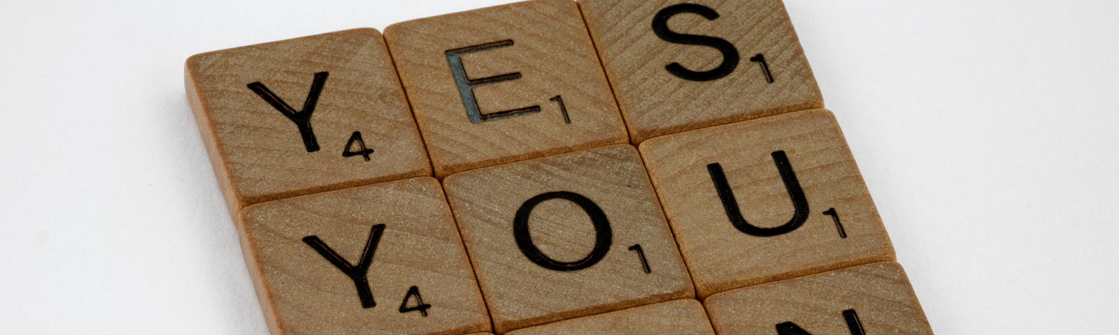 Letters from a Scrabble game, symbolizing skill with letters