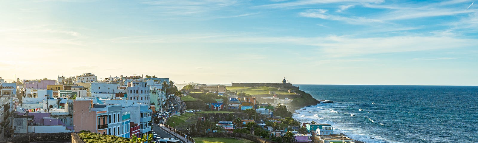 Picture of Old San Juan showing El Morro in the distance and the ocean.