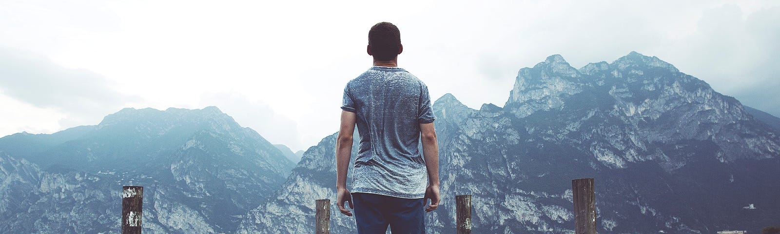 A man staring the mountains