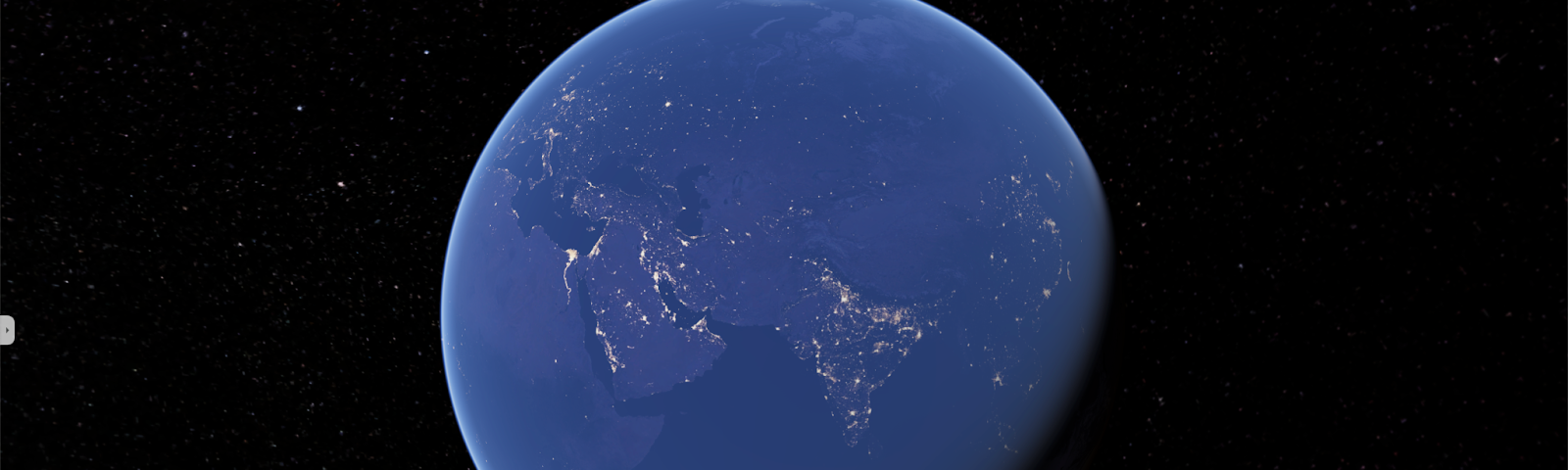 An example of a tile overlay in Google Earth showing NASA’s Black Marble (night lights) imagery.