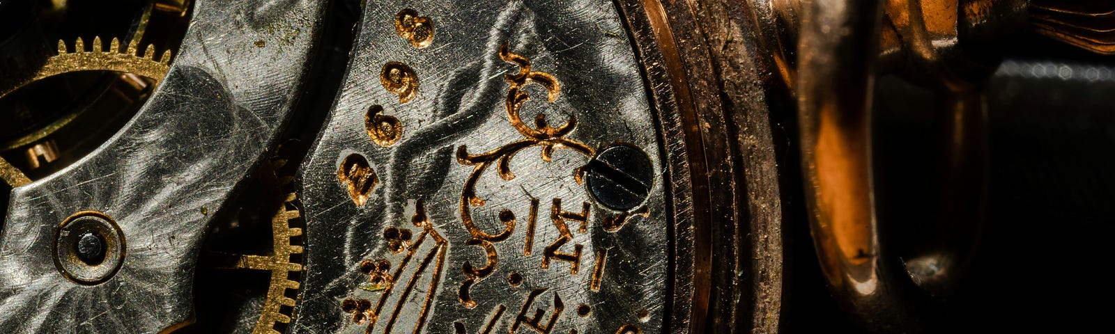 close-up of a detail on an intricate antique pocket watch